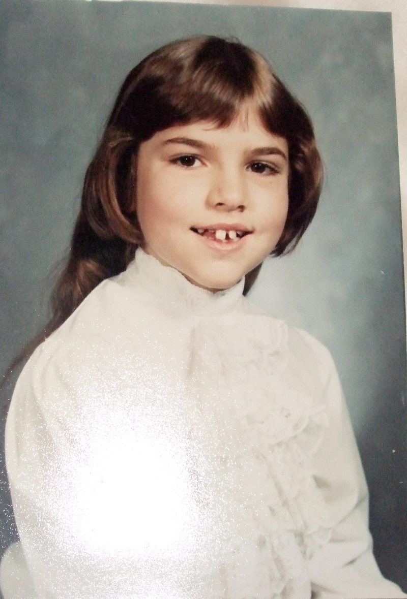 Illustration for article titled Goofy Glasses, Pretty Pigtails & Snaggletooth Smiles: September Is For School Portraits
